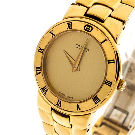 gucci watch gold womens